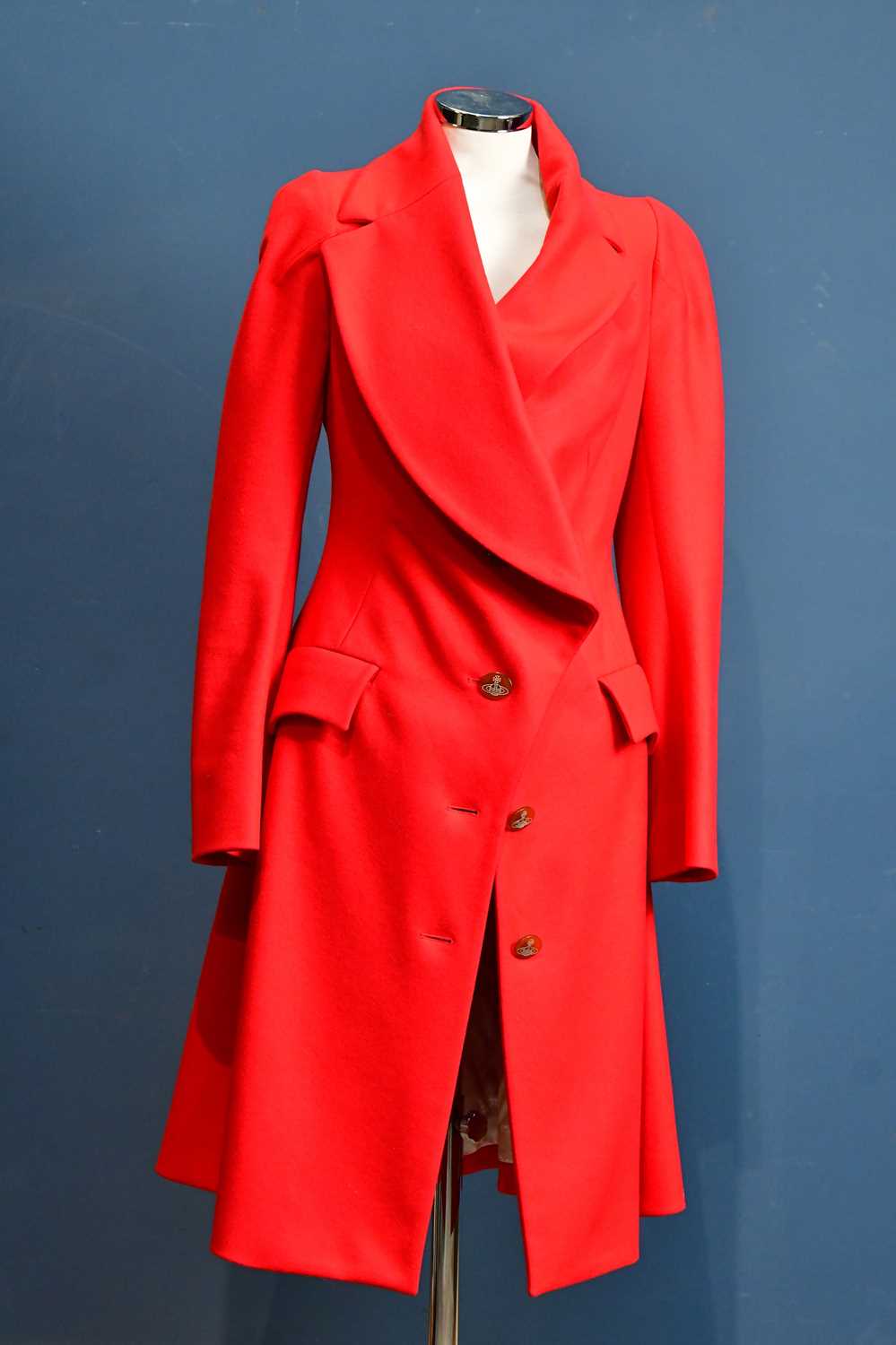 Lot 986 - VIVIENNE WESTWOOD; a red wool cashmere mix...