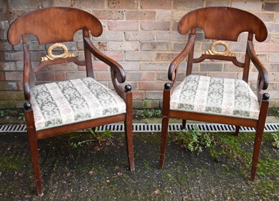 Lot 50 - A pair of Empire Revival elbow chairs with...