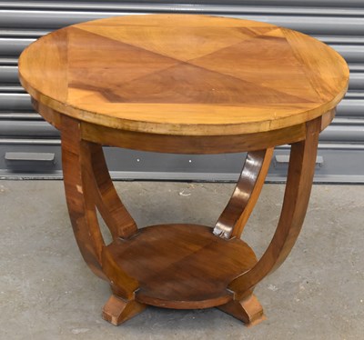 Lot 83 - An Art Deco designed walnut circular two...