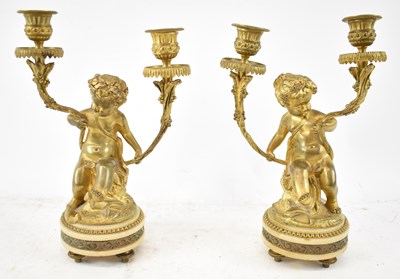 Lot 338 - A pair of 19th century ormolu and white onyx...