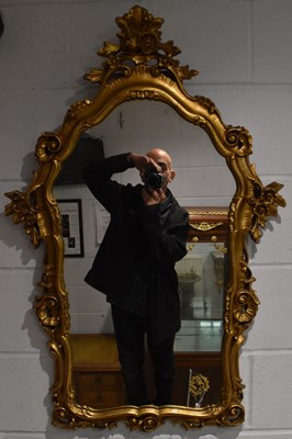 Lot 60 - A contemporary gilt framed wall mirror with...