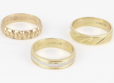 Lot 1067 - Three 9ct gold band rings