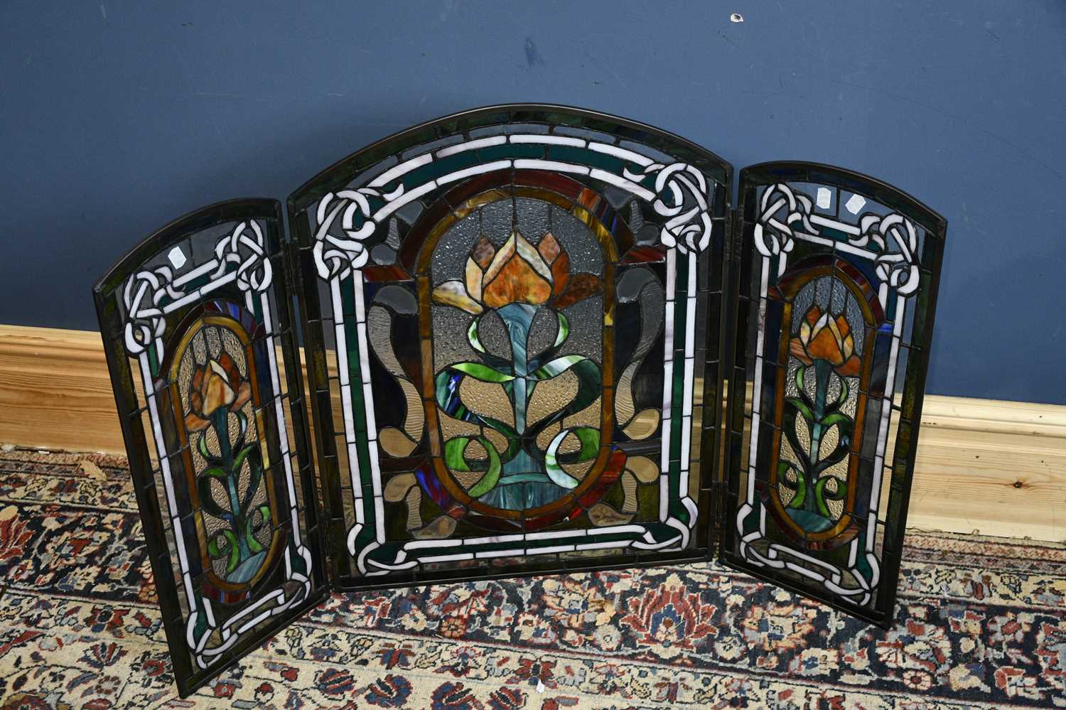 Lot 5076 - A modern stained glass fire guard, height 72cm.