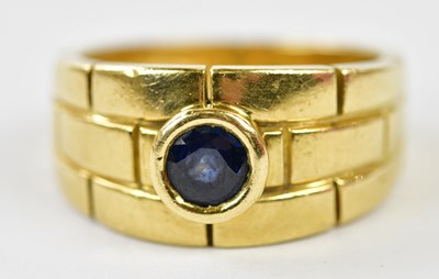 Lot 49 - CARTIER; an 18ct yellow gold and sapphire...