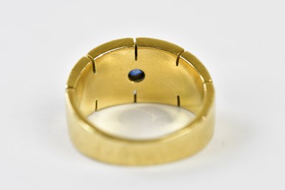 Lot 63 - CARTIER; an 18ct yellow gold and sapphire...