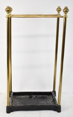 Lot 87 - A cast iron and brass stick stand, height 61.5cm.