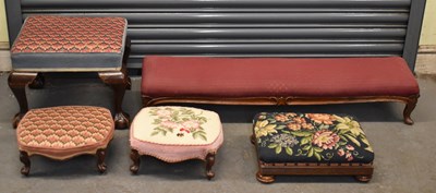 Lot 48 - A group of five footstools, one with claw and...