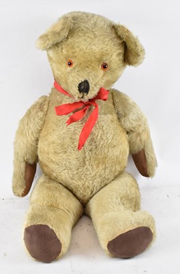 Lot 444 - A large plush stuffed teddy bear with moveable...