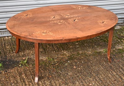 Lot 82 - A Victorian walnut topped coffee table with...