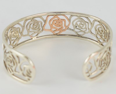 Lot 1073 - CLOGAU; a silver and rose gold 'Royal Roses'...