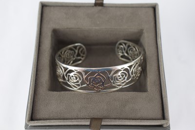 Lot 1073 - CLOGAU; a silver and rose gold 'Royal Roses'...