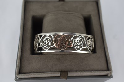 Lot 1073 - CLOGAU; a silver and rose gold 'Royal Roses'...