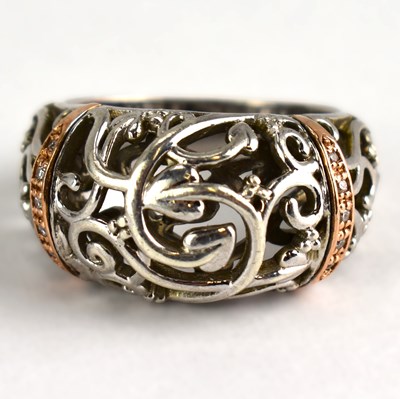 Lot 1055 - CLOGAU; a silver, rose gold and diamond ring...