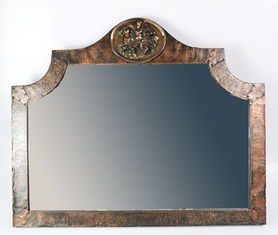 Lot 64 - An early 20th century copper clad wall mirror...