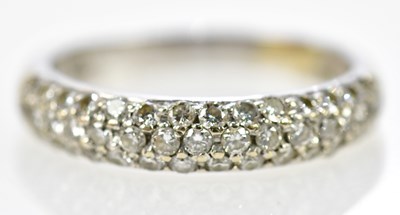 Lot 131 - An 18ct white gold brilliant cut pave diamond...