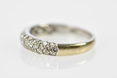 Lot 131 - An 18ct white gold brilliant cut pave diamond...