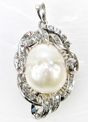 Lot 377 - A white metal pearl and diamond set pendant...