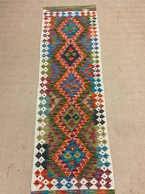 Lot 545 - A Chobi Kilim runner, length 198cm, width 63cm.