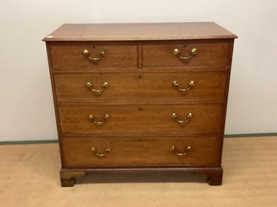 Lot 667 - An oak chest of drawers, two over three...