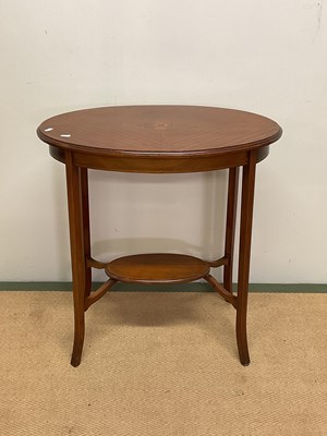 Lot 668 - An oval mahogany side table, with undertier,...