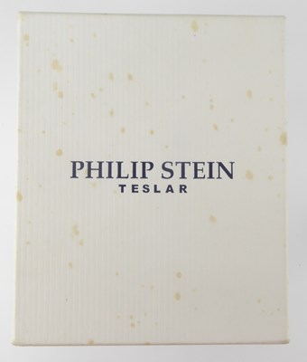 Lot 1191 - PHILIP STEIN; a Teslar Dual Time Zone watch,...