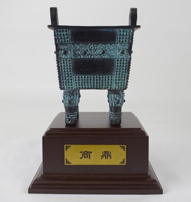 Lot 662 - A modern small Chinese bronze censer of square...