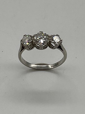 Lot 374 - A platinum and diamond three stone ring, the...