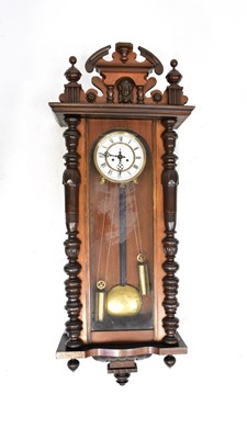 Lot 103 - A Vienna regulator wall clock in a mahogany...