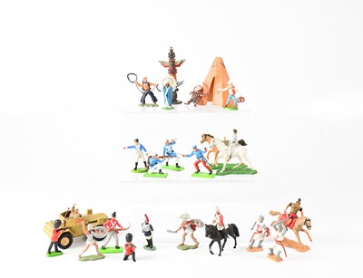 Lot 202 - A collection of plastic toy figures, including...