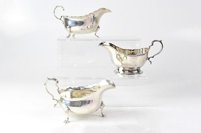 Lot 900 - MAPPIN & WEBB; three hallmarked silver sauce...