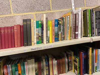 Lot 305 - Twelve shelves of assorted books, the majority...