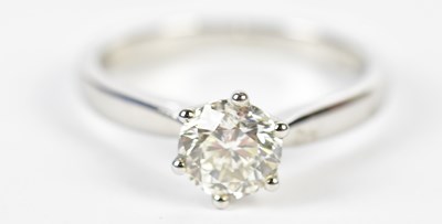 Lot 47 - A platinum and diamond solitaire ring, the...