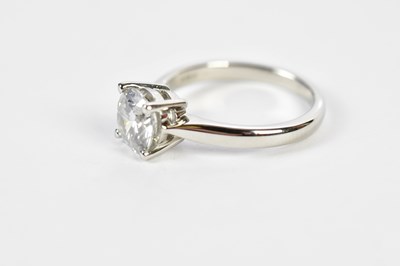 Lot 35 - A platinum and diamond single stone ring, the...