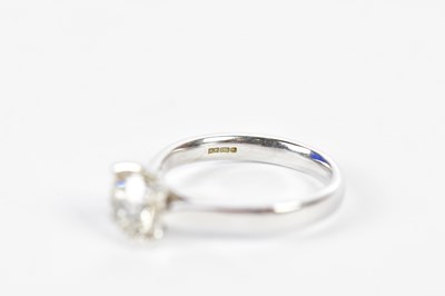 Lot 33 - An 18ct white gold diamond solitaire ring, the...