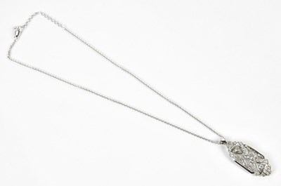 Lot 309 - An 18ct white gold and diamond set pendant of...