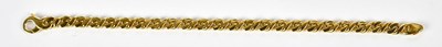 Lot 497 - An 18ct yellow gold flat link fancy bracelet,...