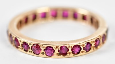 Lot 272 - A rose gold coloured synthetic ruby full...