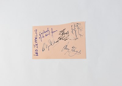 Lot 841 - LED ZEPPELIN; a torn page from an autograph...