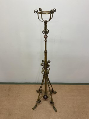 Lot 519 - A late Victorian adjustable brass standard...