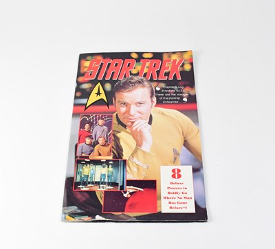 Lot 831 - STAR TREK; a large format poster book of eight...