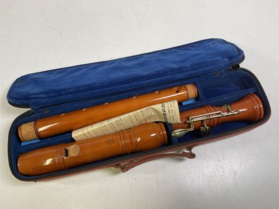 Lot 47 - Two musical instruments including a flute and...