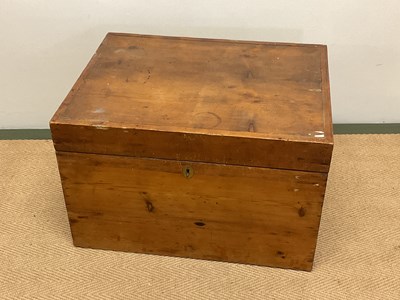 Lot 648 - A pine trunk with brass handles, height 38cm,...