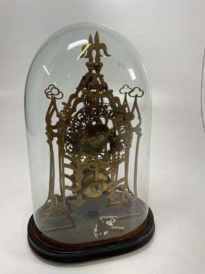 Lot 502 - A late 19th century brass skeleton clock with...