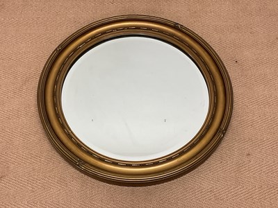 Lot 609 - Circular gilt framed mirror, width 64cm.