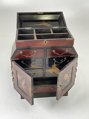 Lot 35 - An Oriental inlaid and lacquered table top...