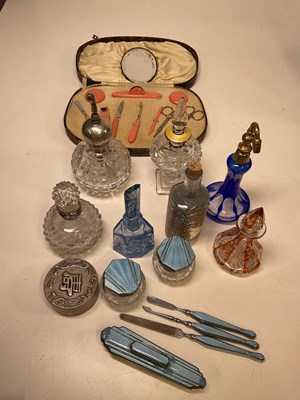 Lot 464 - A group of scent bottles, one with silver cap...