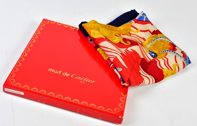 Lot 933 - MUST DE CARTIER; a 100% silk gold, red, cream...