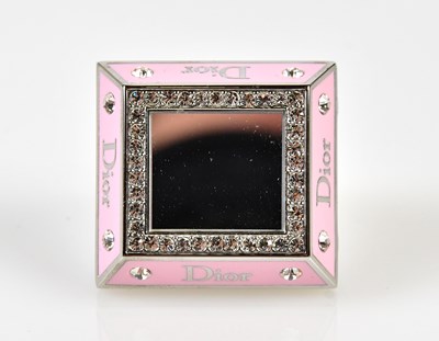 Lot 858 - CHRISTIAN DIOR; a pink stainless steel Dior...