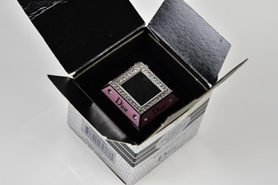 Lot 858 - CHRISTIAN DIOR; a pink stainless steel Dior...