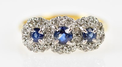 Lot 201 - An 18ct yellow gold sapphire and diamond ring...